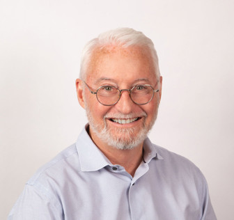A man wearing glasses.