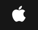 A white apple with a black background.