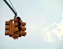 A traffic light with a red light.